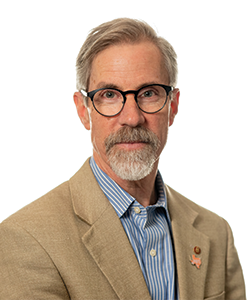 Headshot of Ed Tucker on white background