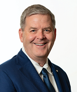 Headshot of Ken Van Tine on white background