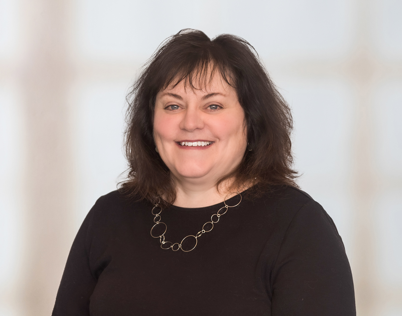 Headshot of Jennifer Arbuckle.