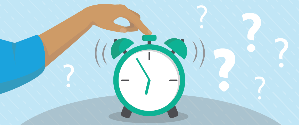 A person hits the top of an alarm clock to stop it. 