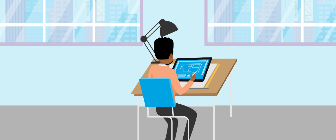 man works at desk on ipad