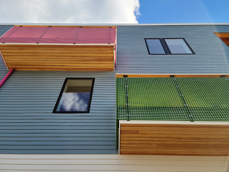 Photo of energy-positive condominiums in Boston's Dorchester neighborhood on Colonial Avenue.