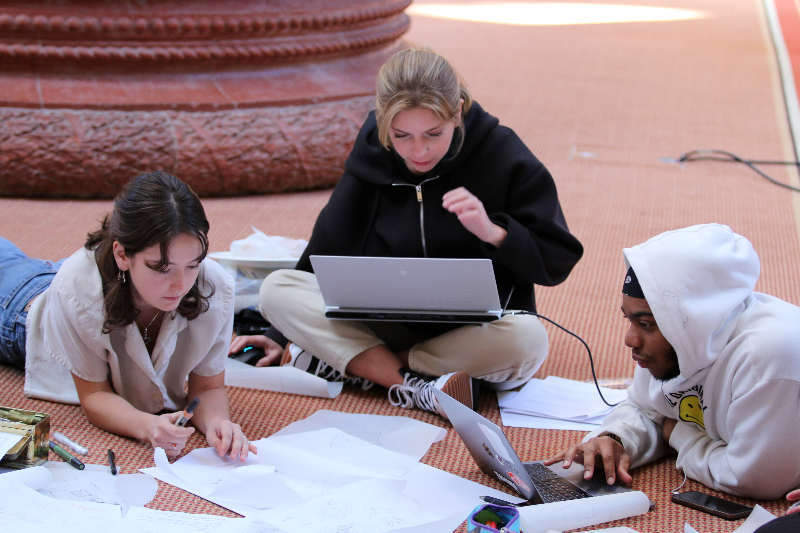 Students working together at 2022 Interschool Student Design Competition.