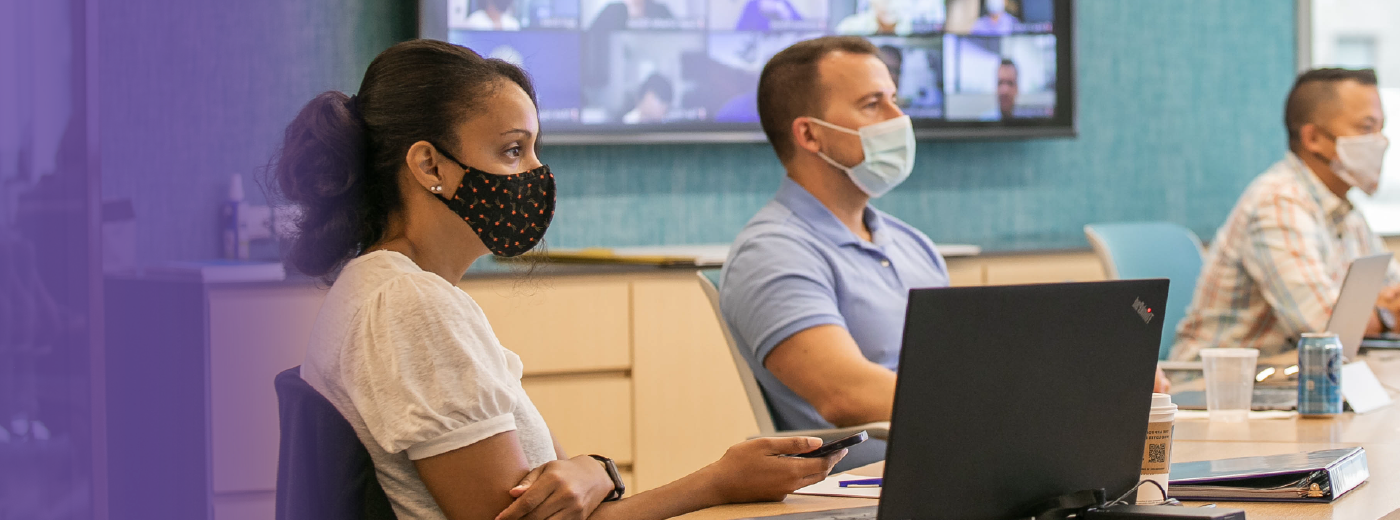 Photo of members wearing masks. 