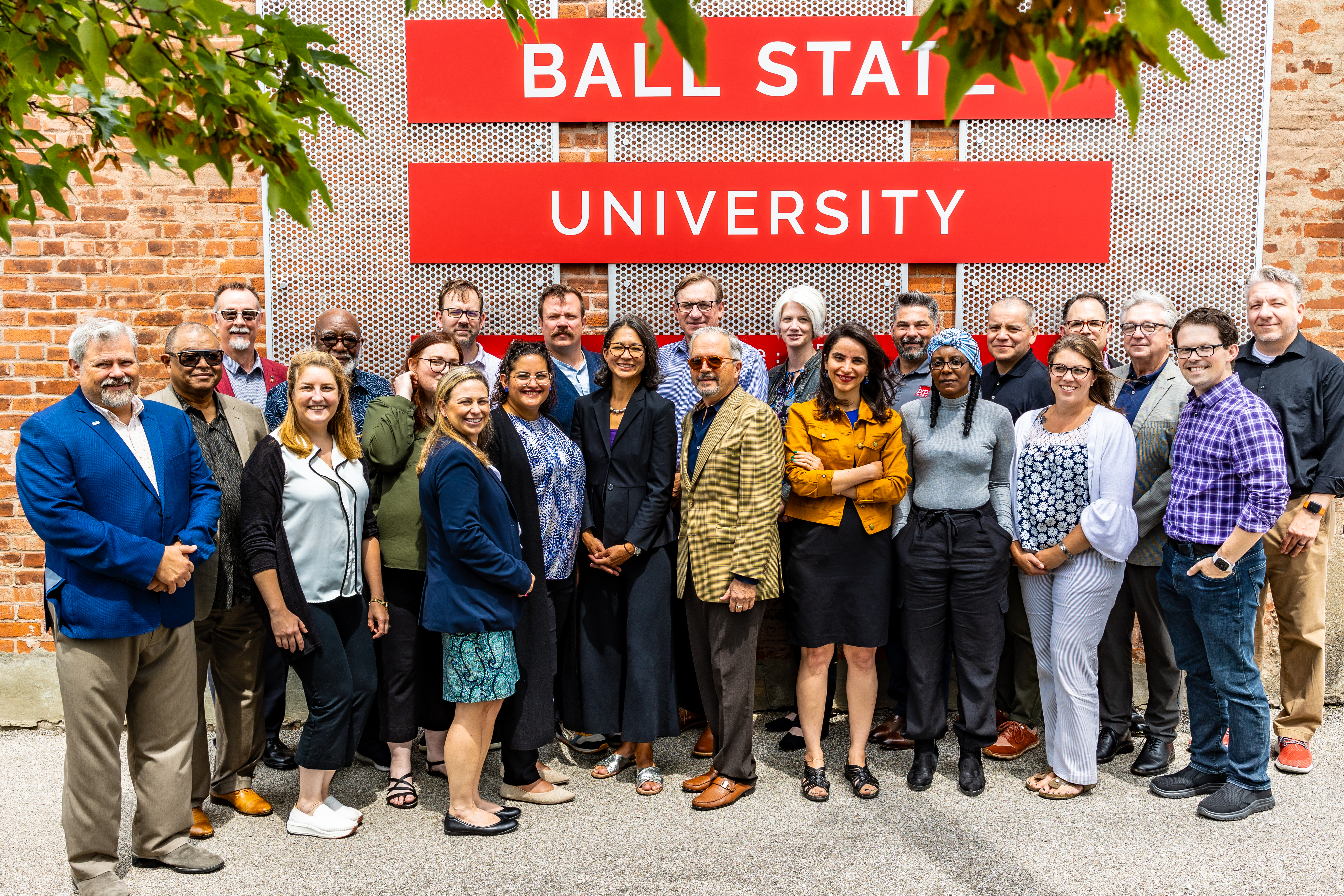 All of the 2023 Scholars attendees pose for a group photo in front of a Ball State University sign.