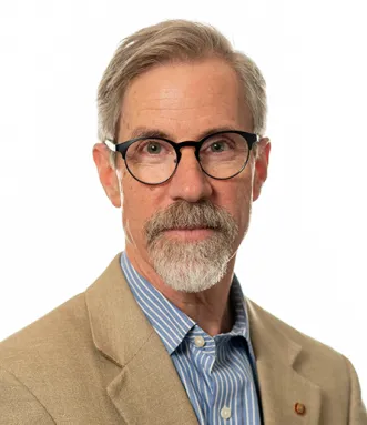 Headshot of Ed Tucker. 