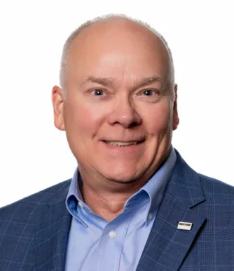 Headshot of John Patrick Rademacher.