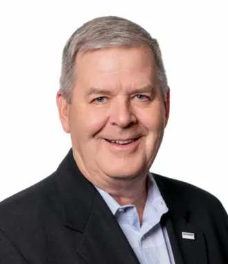 Headshot of Ken Van Tine.