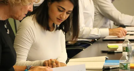 Volunteers discuss architecture during 2019 Think Tank meeting