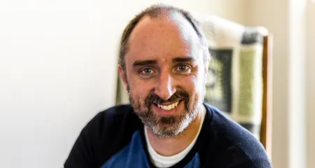 Headshot of Evan Berger. 