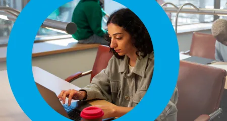 A graphic including a student learning online. 