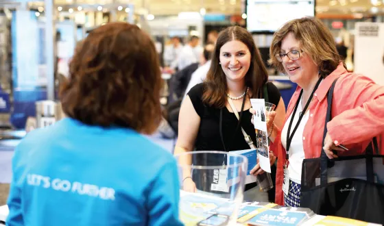 NCARB staff work at an outreach event.