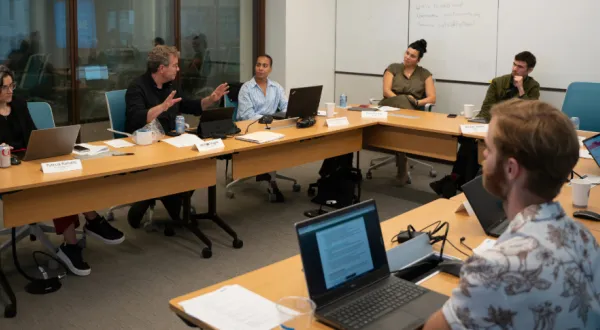 Futures Collaborative members engaged in a discussion. 