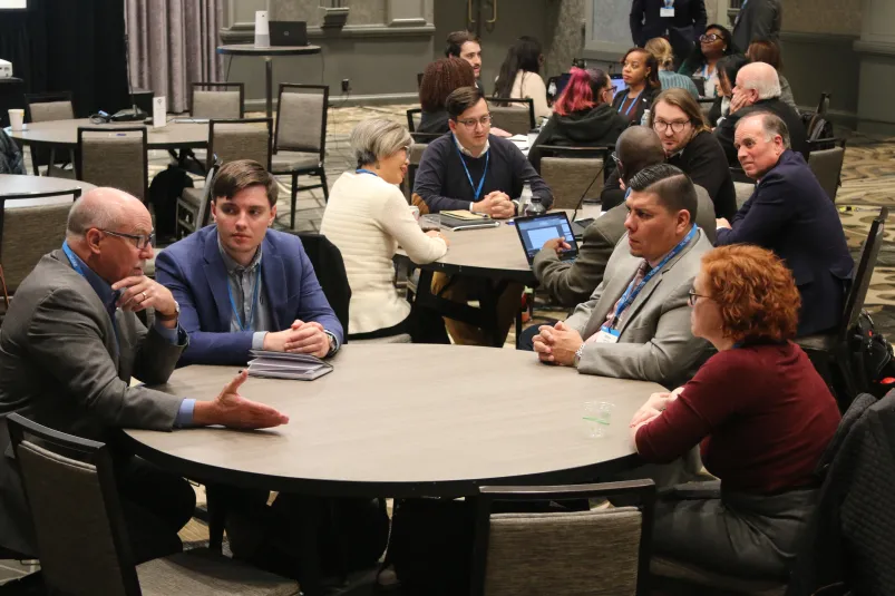 Members of the DEI Committee discuss best practices at the 2022 Committee Summit.