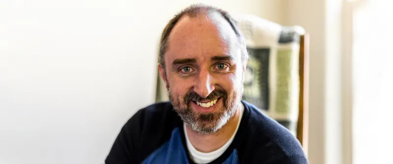 Headshot of Evan Berger. 